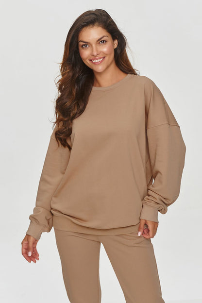 Luxury Makadamia loose-fit sweatshirt in soft cotton blend, featuring an adjustable ribbed neckline and a relaxed fit, perfect for urban chic styling.