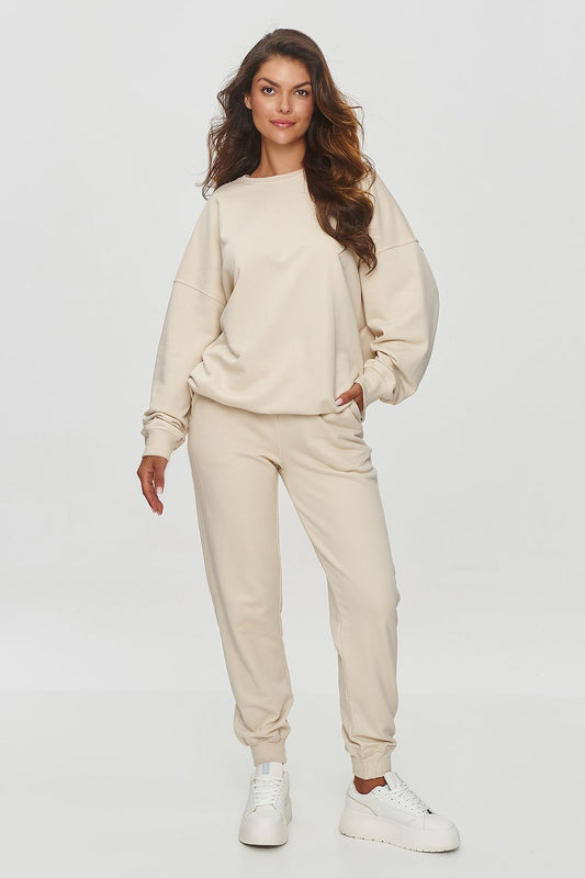 Makadamia luxury classic tapered sweatshirt trousers featuring an elastic waistband and functional side pockets, crafted from soft cotton blend fabric.