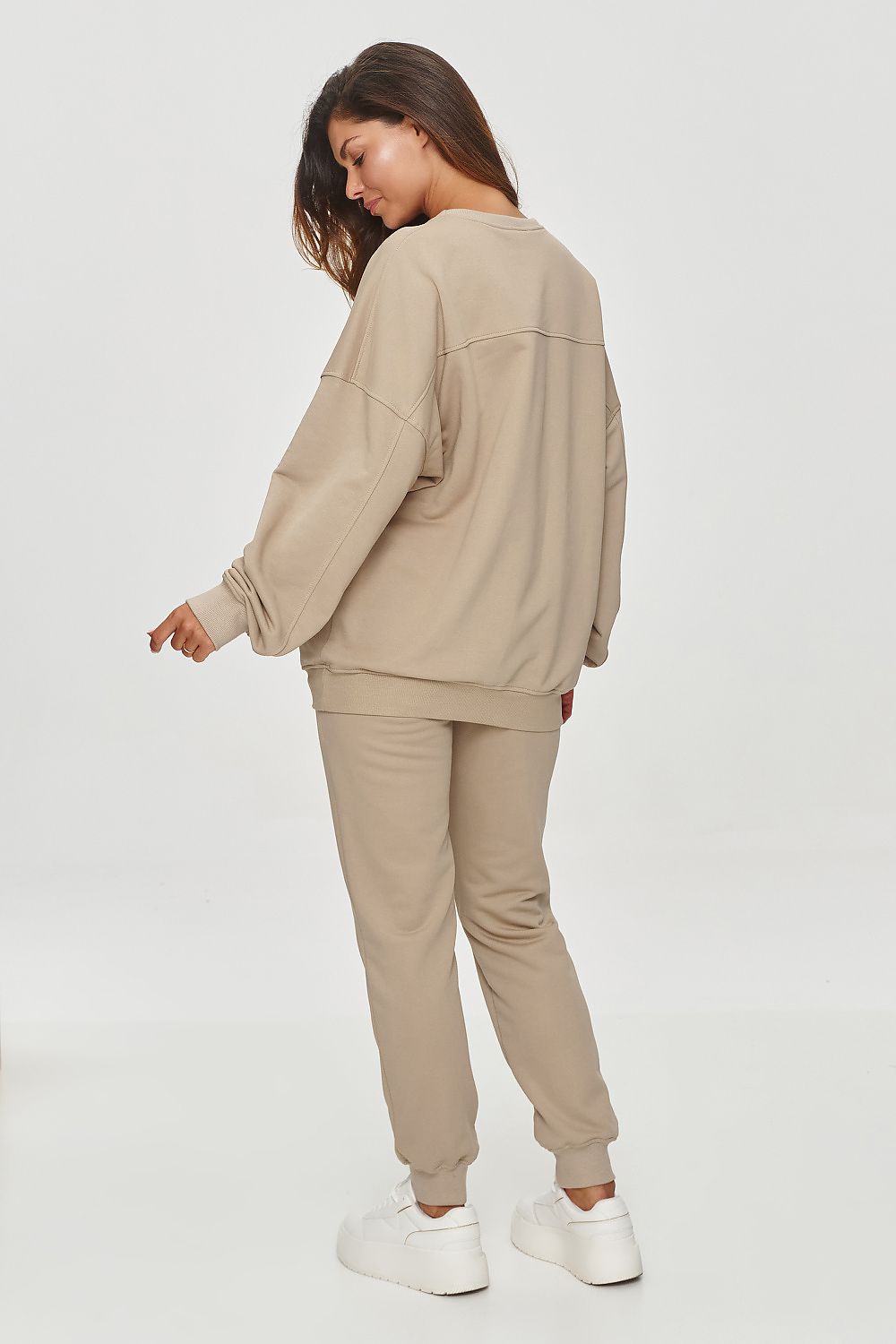 Stylish side pockets of Makadamia Classic Tapered Sweatshirt Trousers, perfect for everyday essentials.