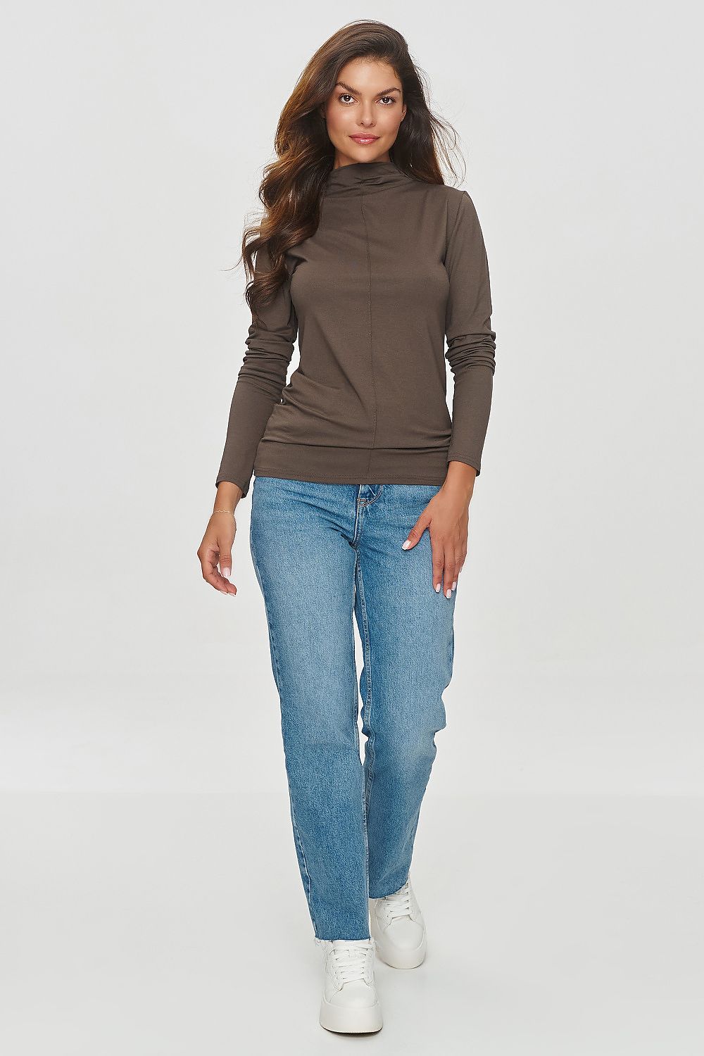 Close-up view of Makadamia blouse showcasing unique front stitching detail, perfect for both casual and formal occasions.