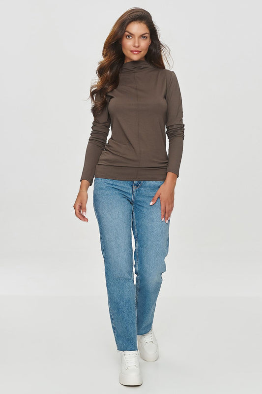 Close-up view of Makadamia blouse showcasing unique front stitching detail, perfect for both casual and formal occasions.