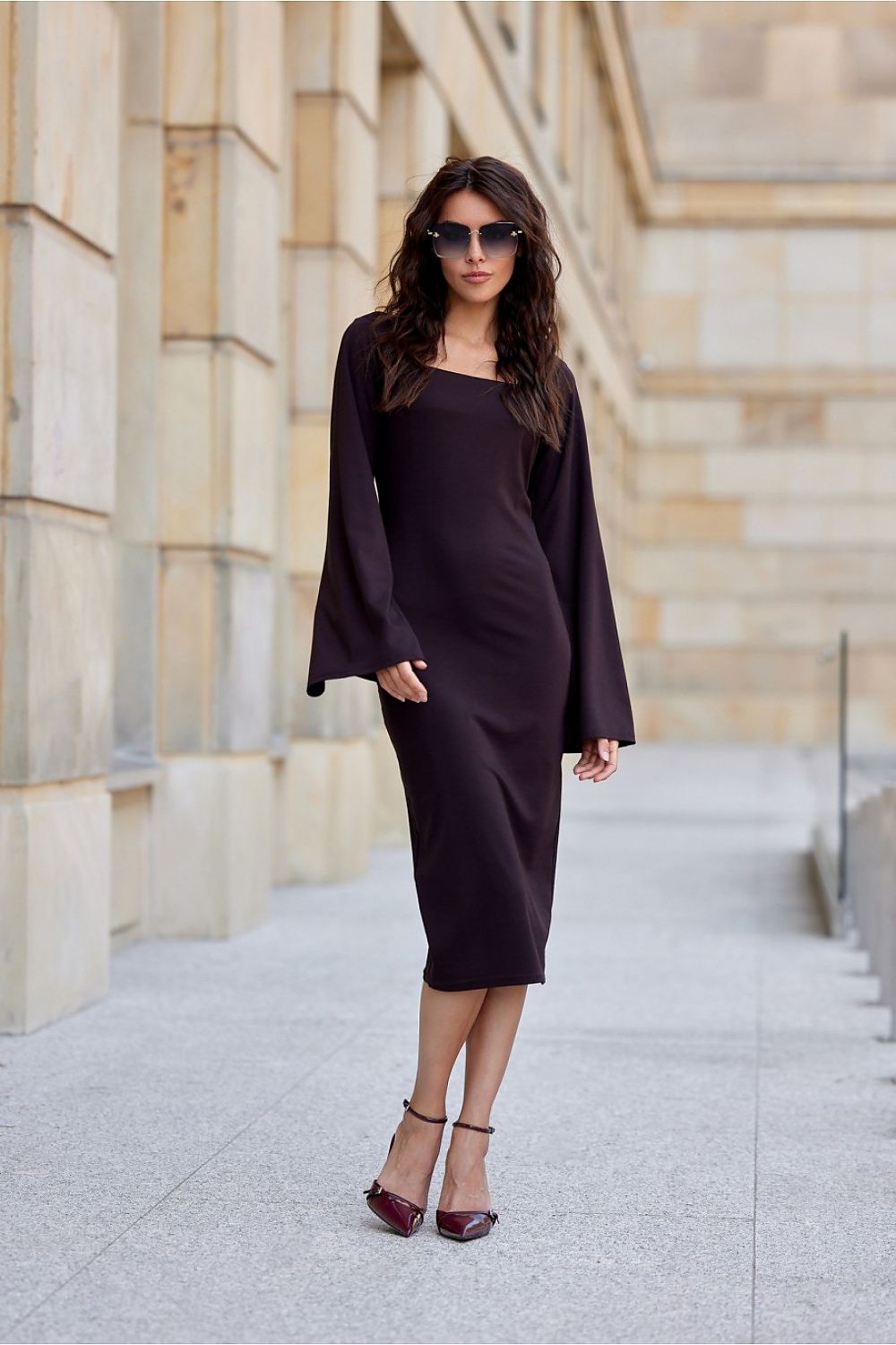 Stylish Roco Fashion midi daydress on a model, demonstrating its flattering silhouette and versatility for both office and evening wear.