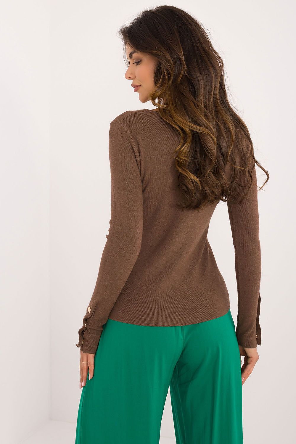 Stylish view of the Elegant Women's Casual Sweater by AT, highlighting its classic length and feminine silhouette, suitable for office or everyday outings.