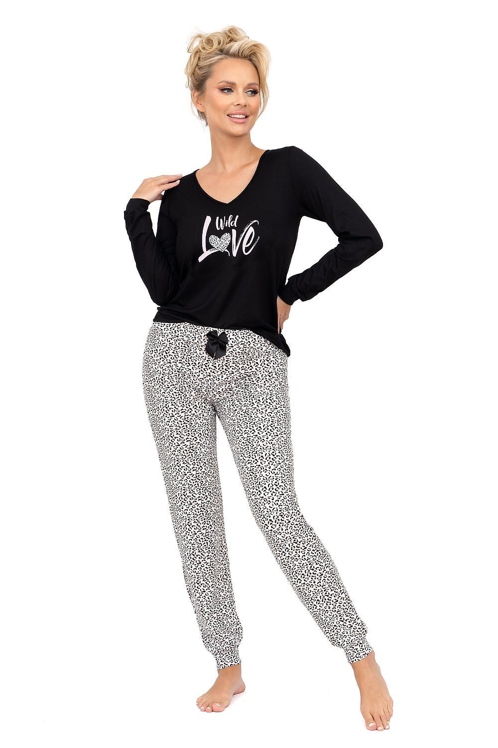 Luxurious women's cotton pajamas set by Donna featuring an elegant long sleeve blouse with ribbed hem and stylish print pants, perfect for homewear or a restful night's sleep.