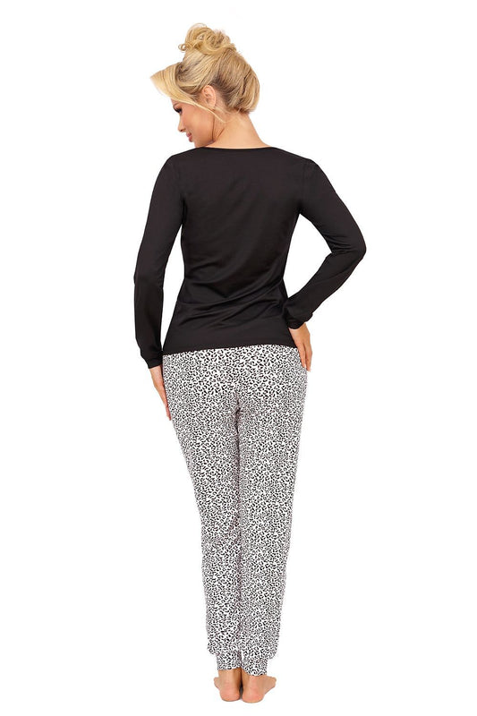 Close-up view of Donna's elegant women's cotton pajamas set, showcasing the refined ribbed hem and detailed print of the stylish pajama pants.