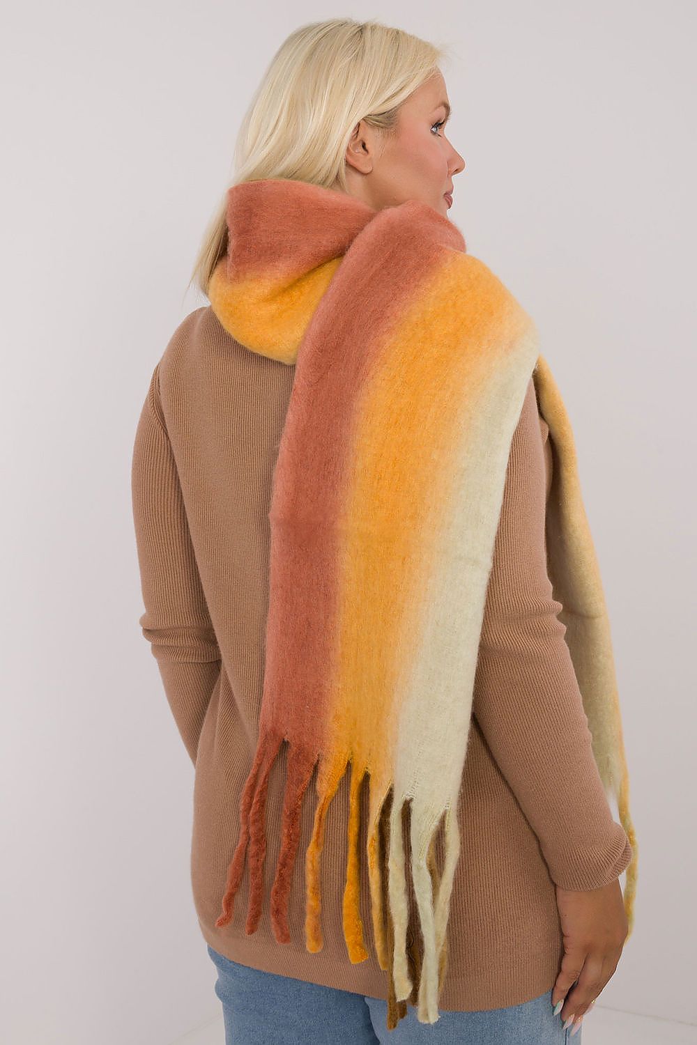 Stylish and warm polyester scarf designed by AT, showcasing a colorful pattern ideal for elegant outfits.