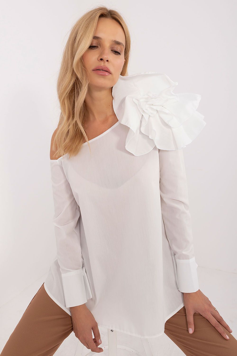 Elegant Lakerta Blouse featuring a decorative fabric flower brooch on the left shoulder, designed for formal occasions.