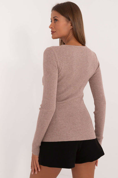 Stylish long sleeve women's sweater by AT, showcasing a classic round neckline and decorative buttons for a refined look.