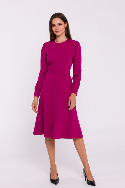 Stylove elegant dress displayed on a model, highlighting the flattering flared cut and waist accentuating belt, suitable for various occasions.