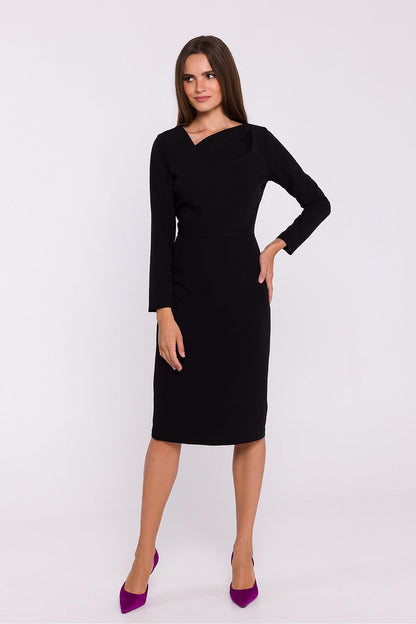 Stylove elegant pencil cut dress showcasing an asymmetrical neckline and long sleeves, perfect for sophisticated occasions.