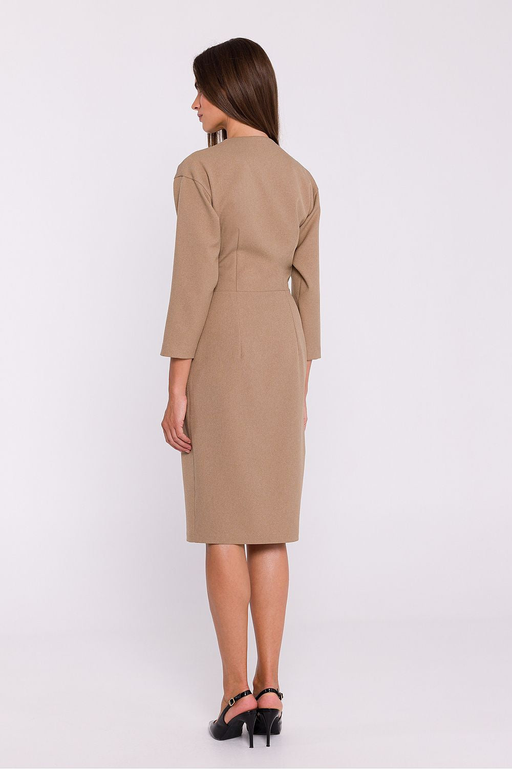 Stylove elegant pencil cut day dress featuring an envelope neckline and decorative buttons, perfect for sophisticated occasions. Designed with elbow-length sleeves and a feminine front slit, this luxurious dress elegantly shapes the silhouette.