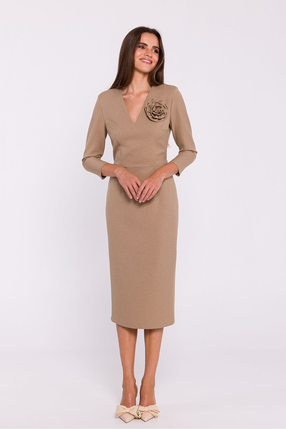 Stylish model wearing Stylove's elegant midi pencil dress, perfect for both formal and casual settings.
