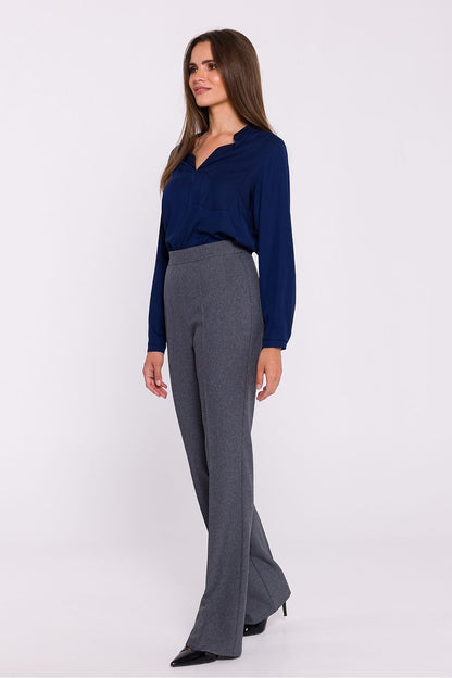 Close-up of Stylish women's flared trousers from Stylove, showcasing excellent fabric quality and sophisticated tailored fit for a polished look.