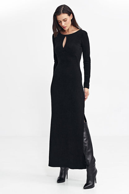 Nife maxi dress showcased on a model, demonstrating its flattering fit-and-flare design with a chic side slit.