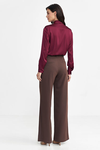 Stylish Nife women's trousers with a modern wide leg design, flaunting decorative pleats and a mid-rise waist for ultimate comfort.