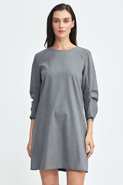 Back view of the Nife Elegant A-Line Daydress highlighting the discreet zipper design and flattering cut, ideal for modern elegance.