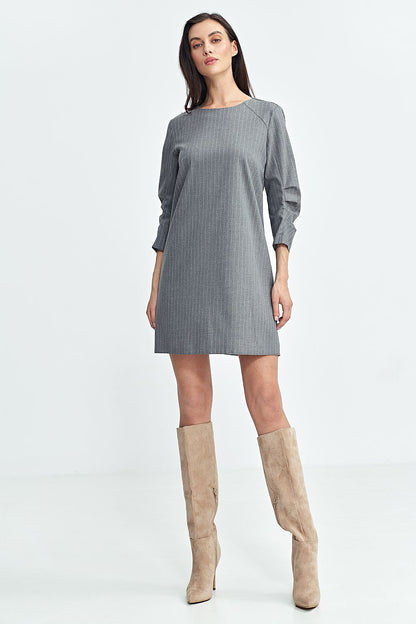 Stylish A-Line Daydress by Nife, showcasing a classic round neckline, 3/4 sleeves with pleats, and a flattering silhouette.