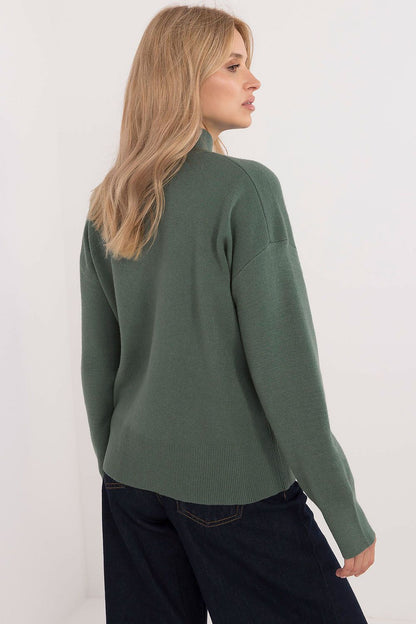 Sublevel's versatile half turtleneck jumper showcased in a casual setting, ideal for layering in autumn and winter looks.