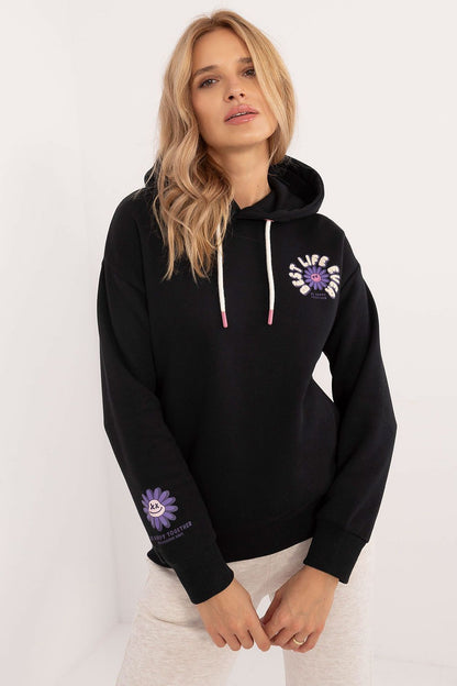 Chic Sublevel women's sweatshirt with fashionable prints and relaxed fit, perfect for luxurious comfort during cooler days.