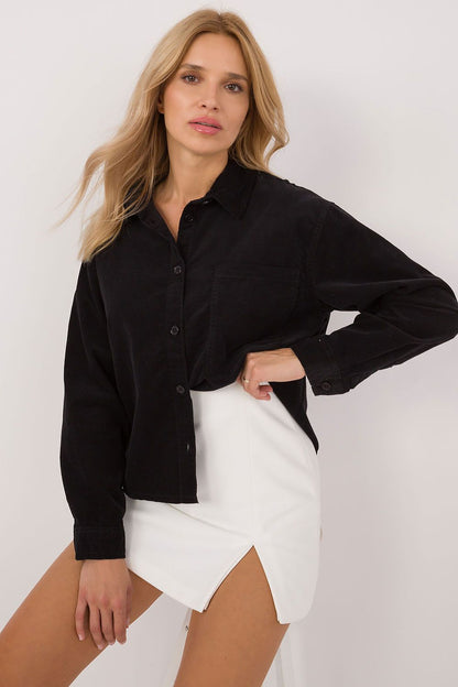 Close-up of the luxurious soft cotton fabric of Sublevel's long sleeve women's shirt, showcasing its breathable texture and classic design.