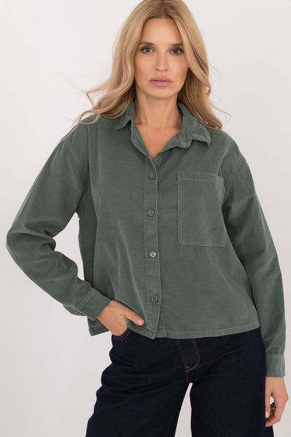 Practical front pocket detail on Sublevel's long sleeve cotton shirt for women, blending functionality with elegance.