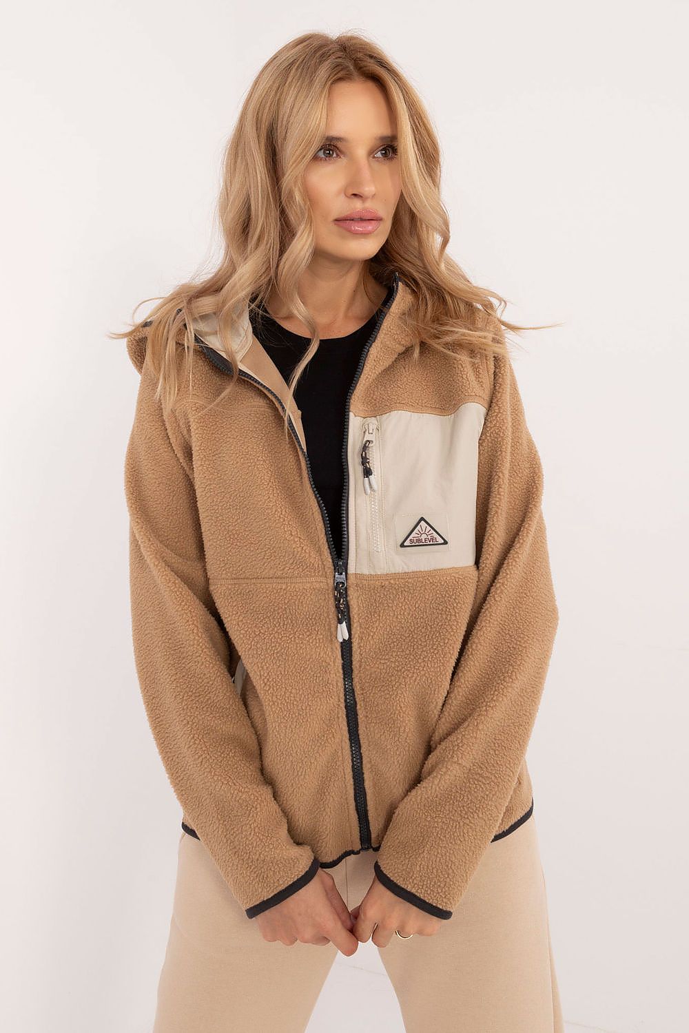 Stylish Sublevel women's hooded sweatshirt with zipper and hood, designed for casual outings while offering a sporty yet sophisticated vibe.