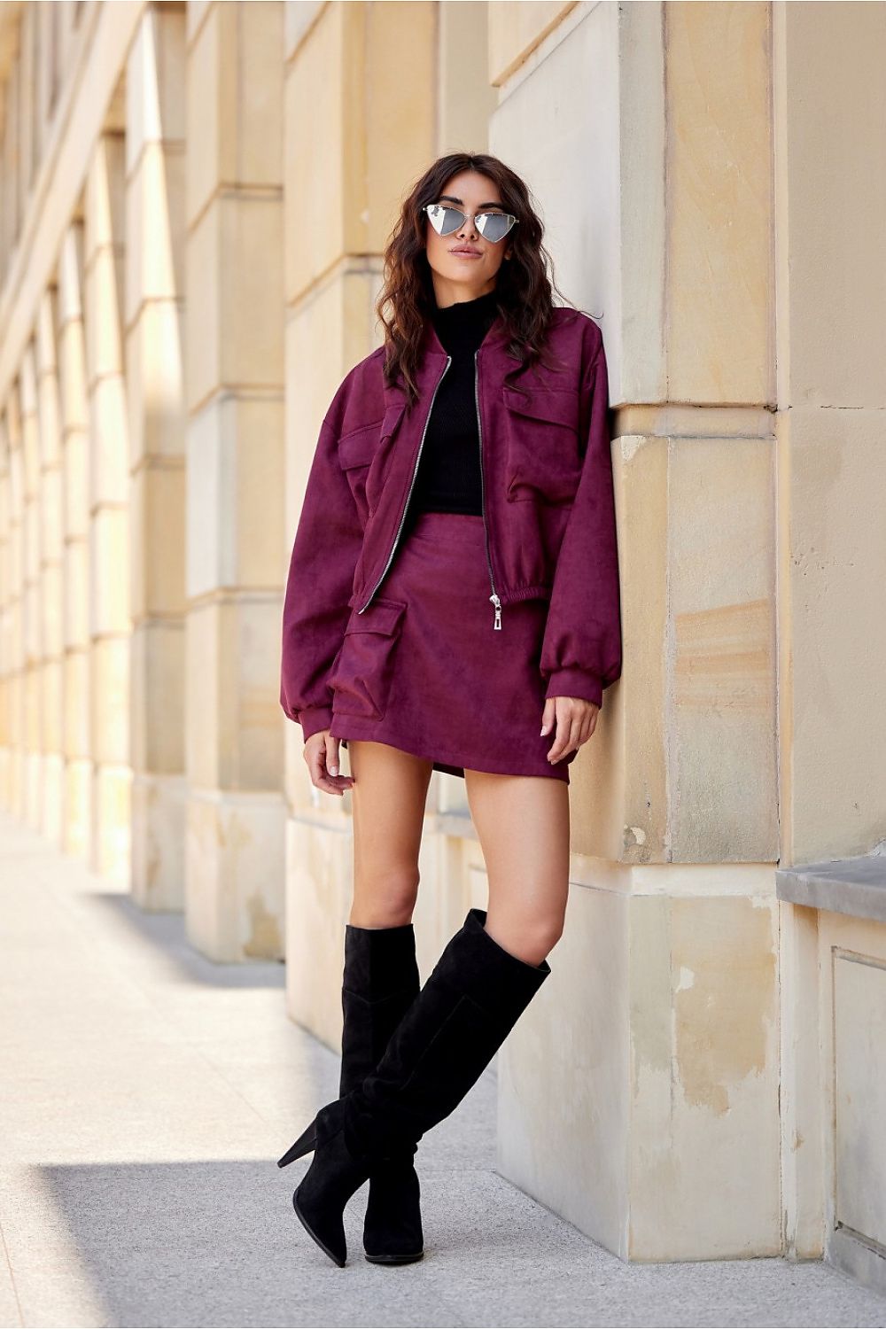 Casual look featuring Roco Fashion Unique Suede Mini Skirt paired with an oversized sweater for a trendy and comfortable outfit.