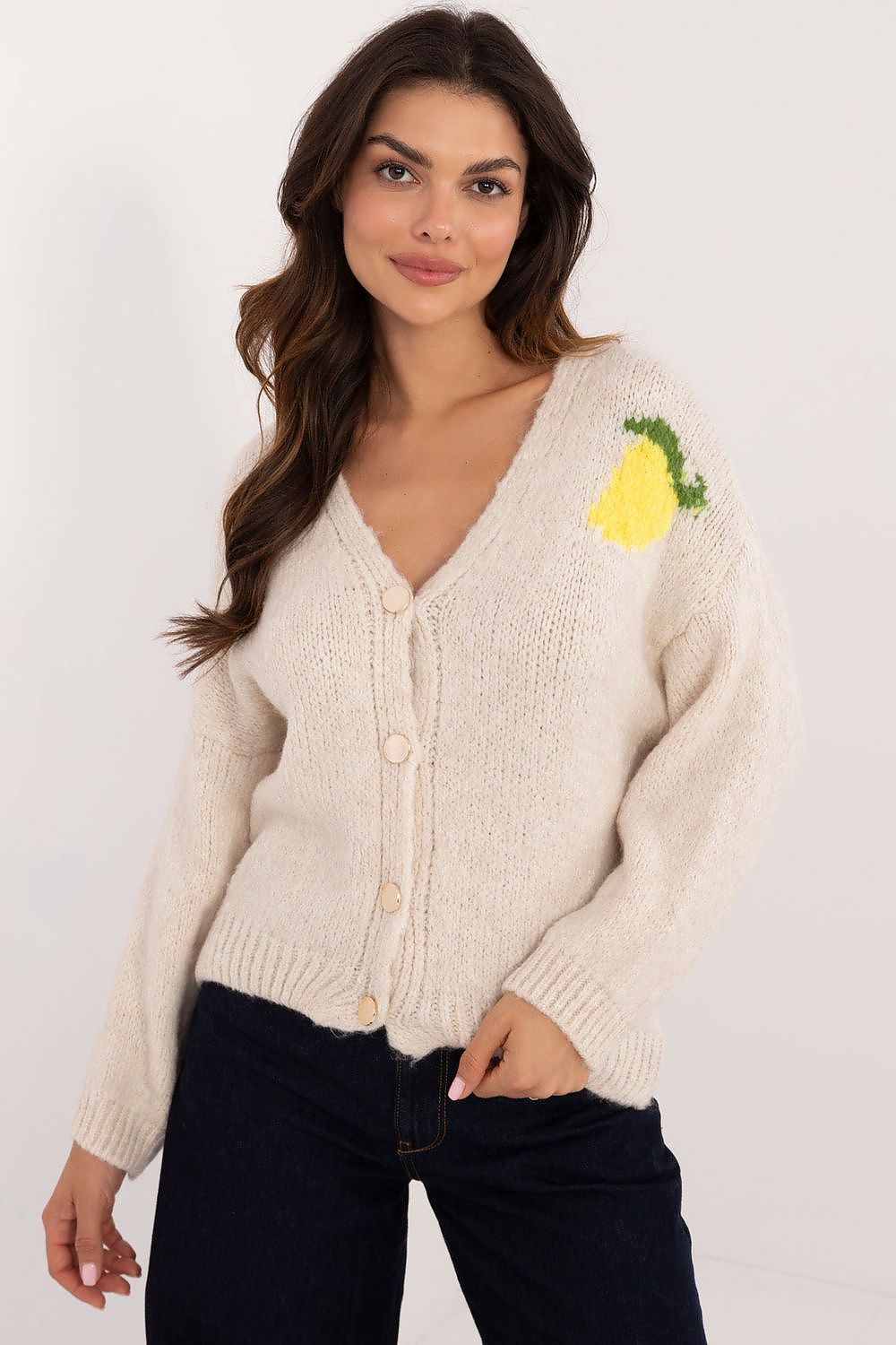 Stylish model wearing the Elegant Ladies' Cardigan by Italy Moda, exemplifying its versatile fit and elegant style in a casual setting.