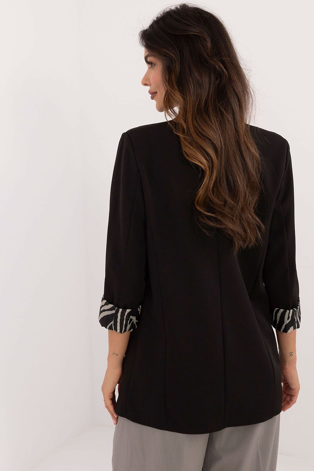 Elegantly designed women's casual jacket by Italy Moda, crafted from high-quality polyester with a smooth pattern, perfect for autumn and winter wear, featuring long sleeves and classic lapels for a chic look.