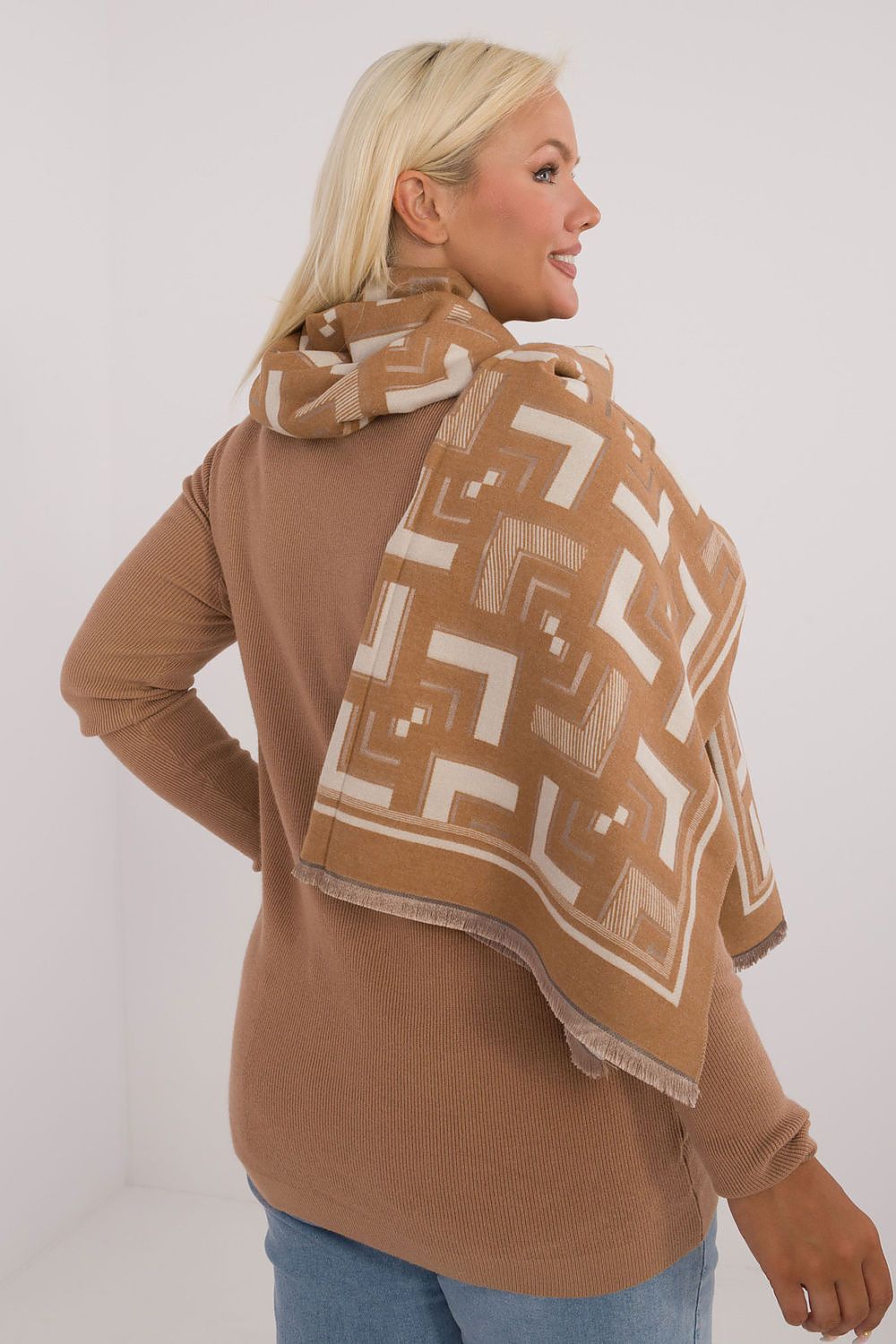 Elegant geometric viscose wool shawl scarf by AT, featuring a modern design and subtle tassels, perfect for stylish layering.
