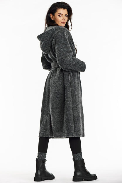 Elegant Awama long hooded coat displayed on a mannequin, highlighting its sophisticated shawl collar and lightweight design for casual and formal occasions.