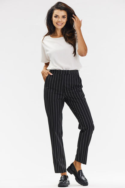 Luxury tailored cigarette pants in elegant gray with white pinstripes for women by Awama, perfect for pairing with sophisticated attire.