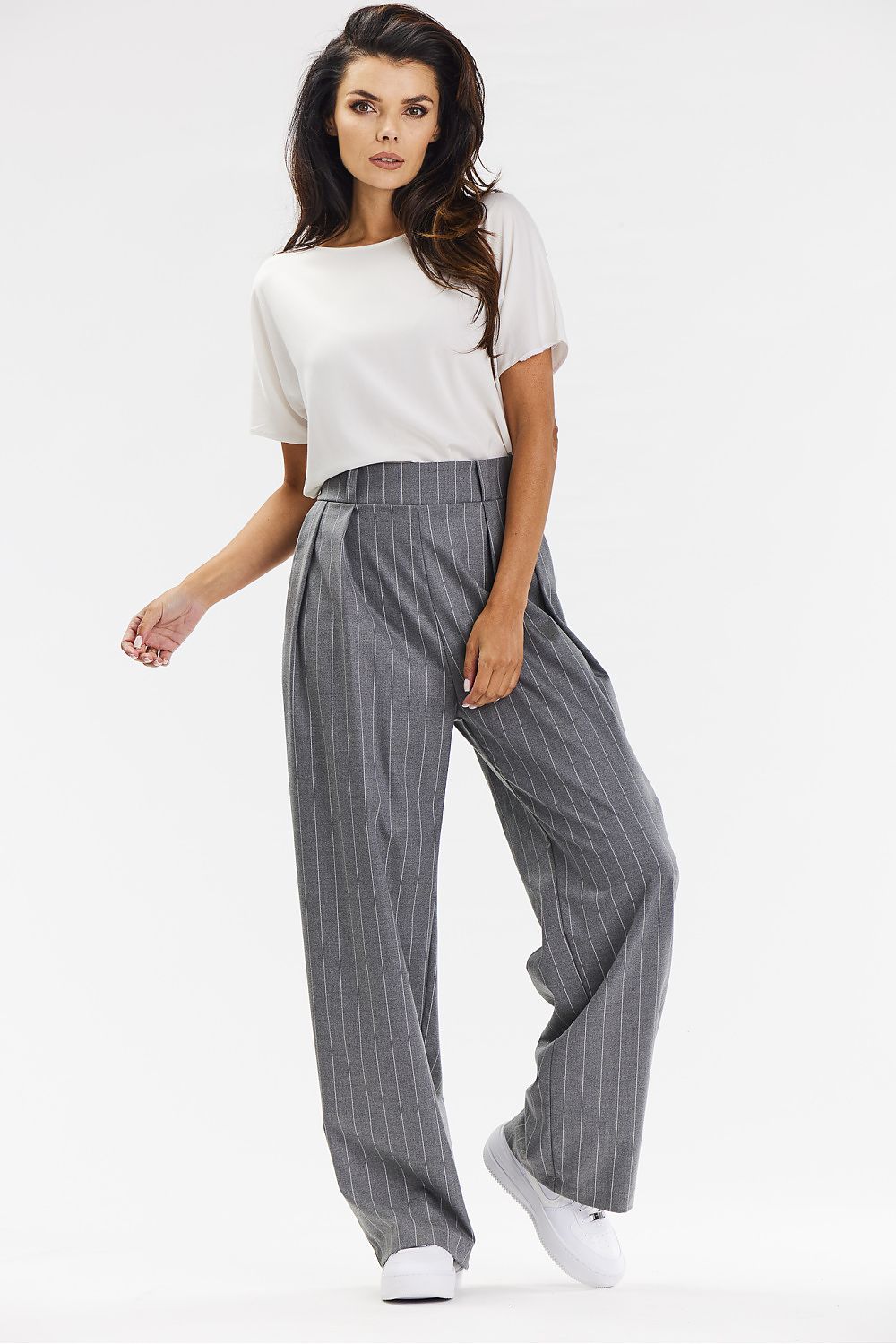 Elegant wide-leg grey trousers with white stripe by Awama, made from soft viscose fabric, perfect for chic office wear and casual styling.
