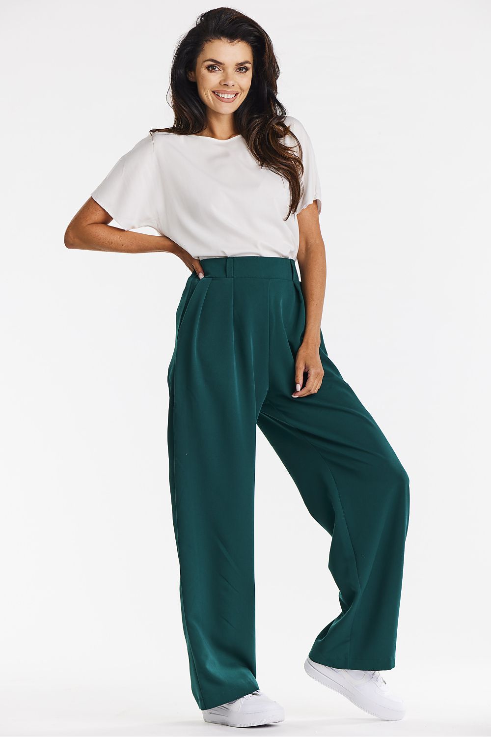 Elegant gray wide-leg trousers for women by Awama displayed with various footwear options, showcasing versatility in casual and elegant styling.