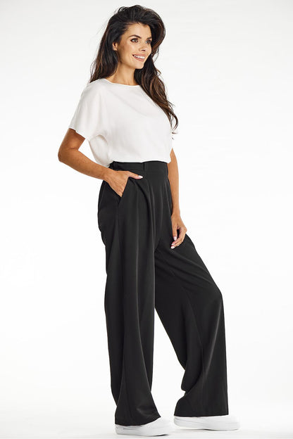 Chic gray wide-leg trousers designed by Awama, made from soft viscose fabric, perfect for both casual and elegant looks.