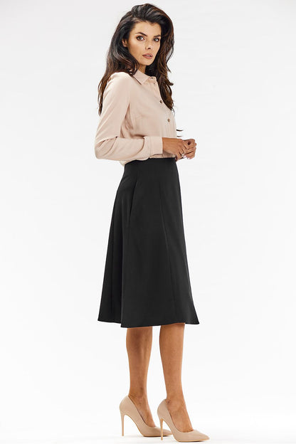 Stylish outfit pairing of awama's elegant grey midi skirt with a tailored shirt, demonstrating perfect styling for professional and formal settings.