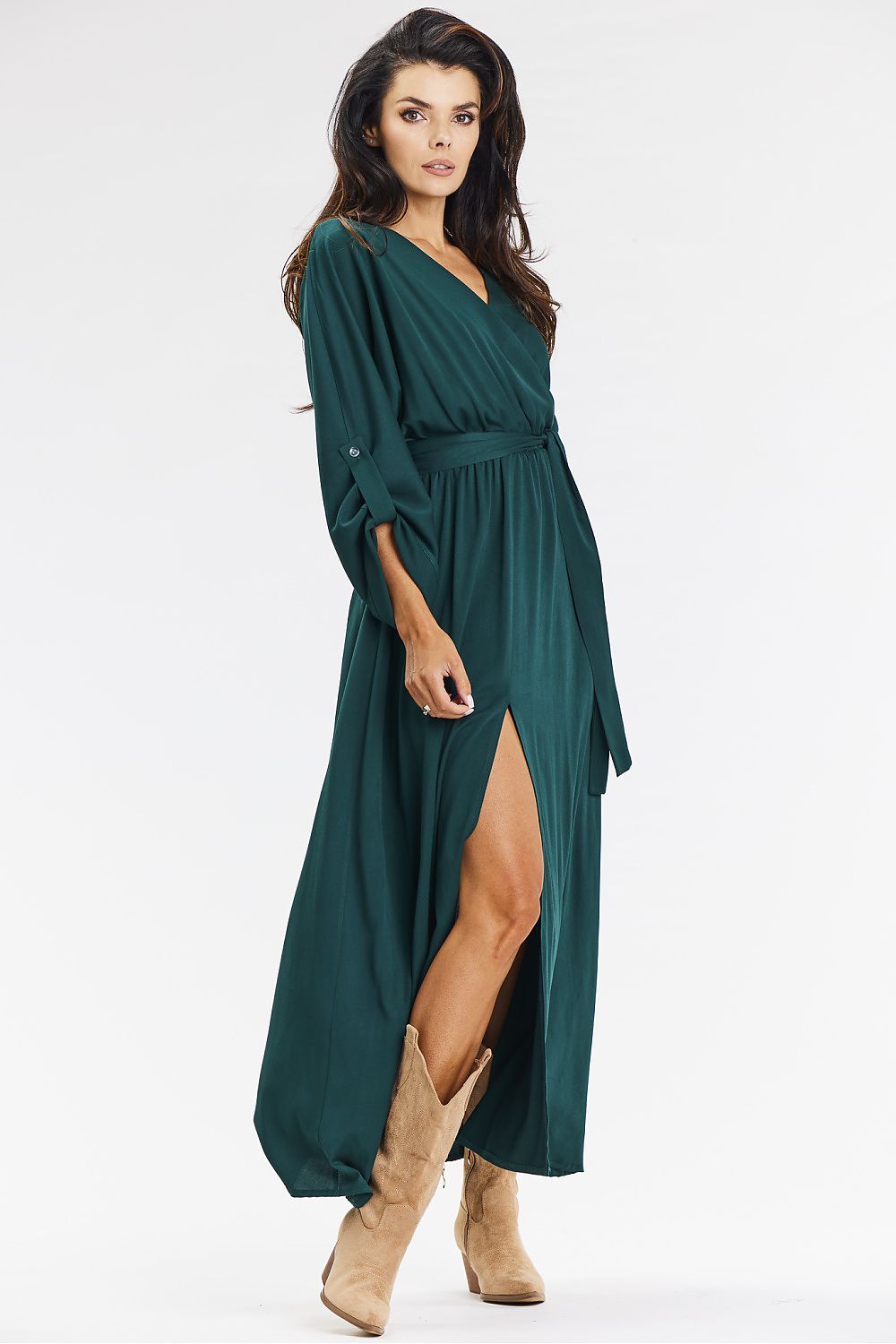Luxurious green loose envelope maxi dress by Awama, showcasing elegant viscose fabric with a stylish front slit, perfect for casual and sophisticated occasions.