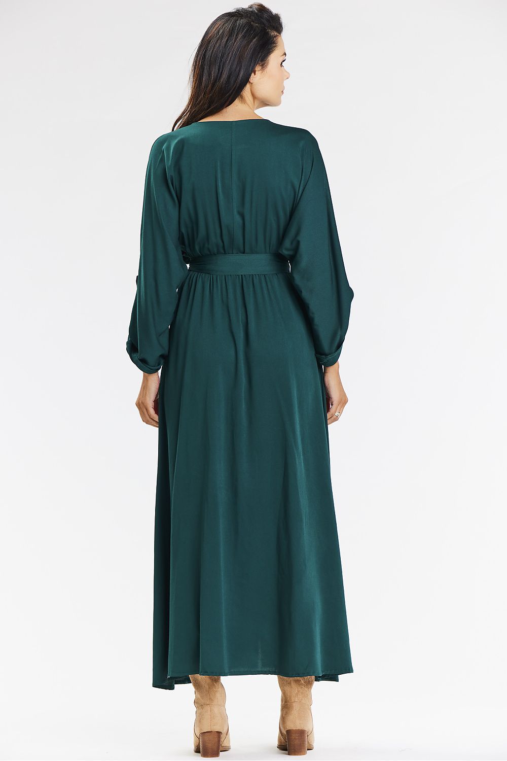 Elegant green loose envelope maxi dress by Awama, showcasing a stylish slit and a perfect fit for luxurious comfort.