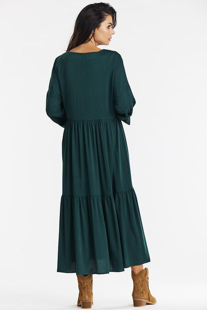 Elegant green kimono maxi dress by awama, made from soft viscose with a ruffle hem for a luxurious look.