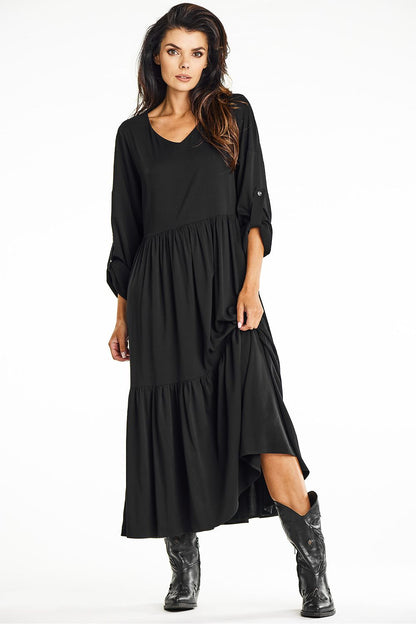 Chic green kimono maxi dress from awama, designed with a lightweight viscose fabric and stylish ruffle detailing.
