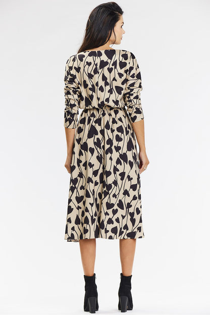 Sophisticated styled dress by Awama showcasing the perfect fusion of elegance and comfort in a navy blue and brown kimono design.