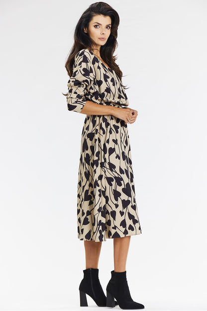 Luxury kimono midi dress by Awama, designed with a feminine silhouette, featuring a V neckline and chic 3/4 rolled sleeves.