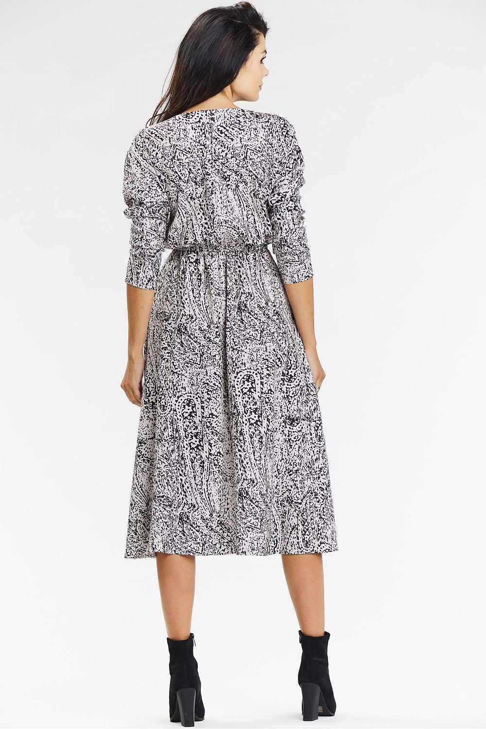 Awama's chic kimono midi dress with sewn-in waist belt, accentuating curves while offering comfort and elegance for any upscale setting.