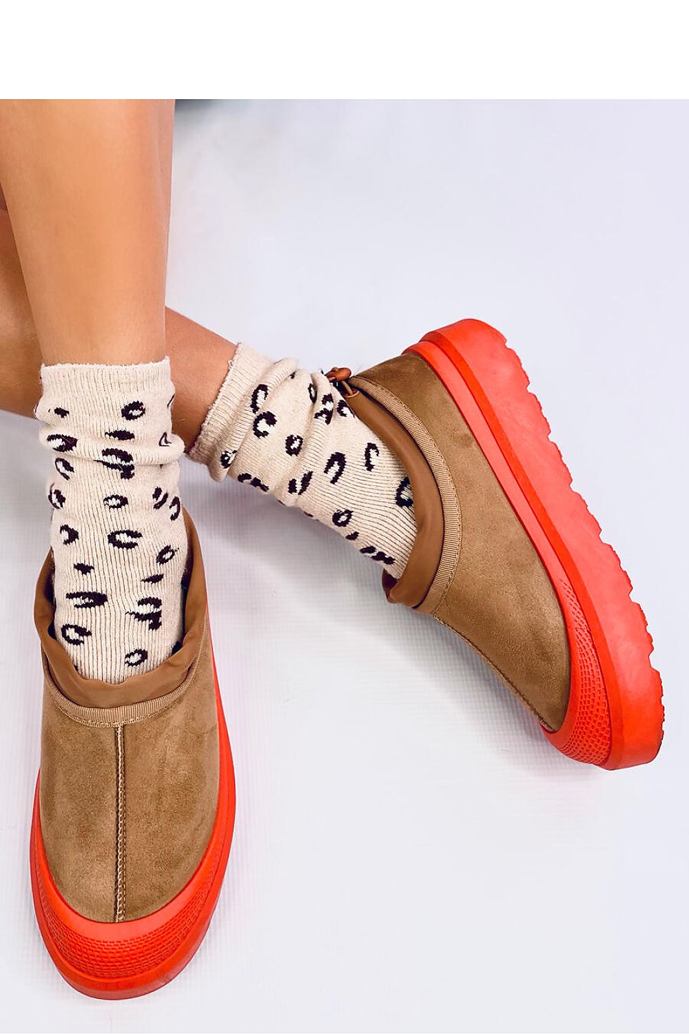 Stylish ecological suede short snow boots for women by Inello, designed with an adjustable welt for a secure fit and warmth.