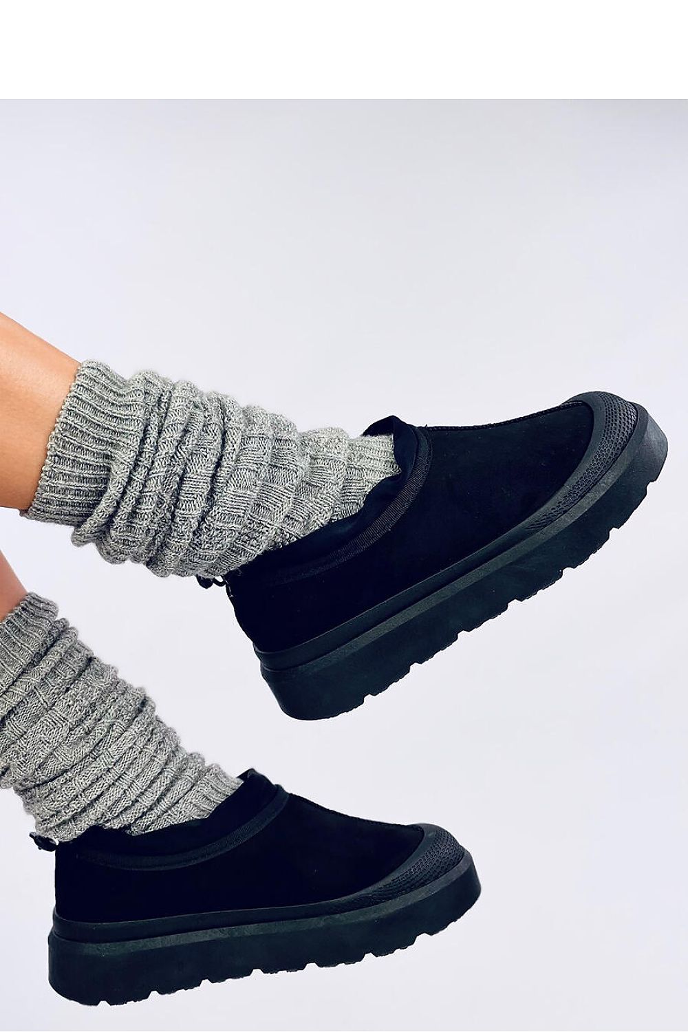 Inello Women's luxurious short snow boots featuring thick fur lining for ultimate warmth and a non-slip rubber sole for superior grip and style.