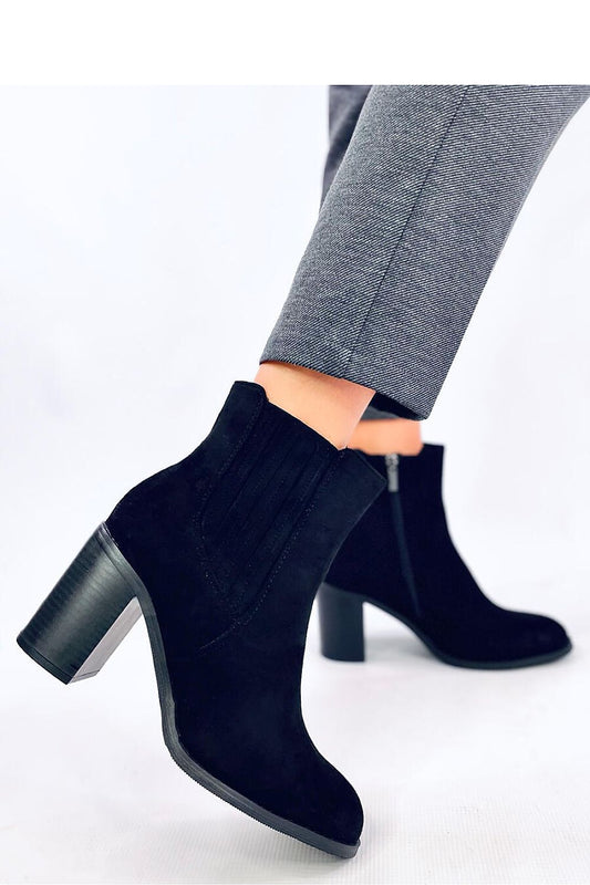 Elegant Women's Black Heel Boots by Inello, featuring an 8cm heel height, elastic insert, and luxurious soft fur lining, perfect for autumn styling.