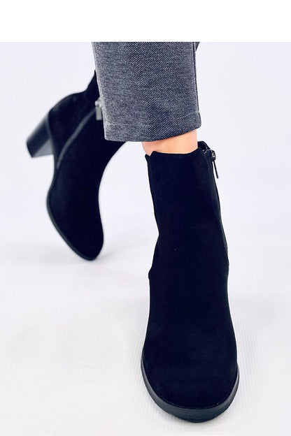 Inello's sophisticated Women's Black Heel Boots with 8cm heels and eco-friendly suede, showcasing a side elastic insert and plush fur lining.