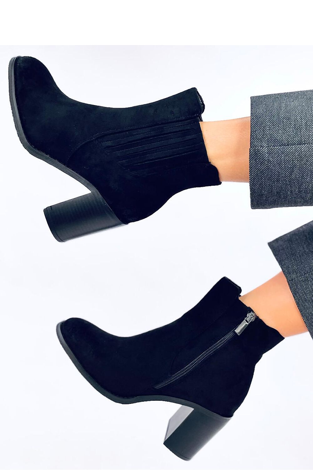 Elegant women's black heel boots by Inello, featuring 8cm heels, elastic insert, and soft fur lining, perfect for autumn styling.