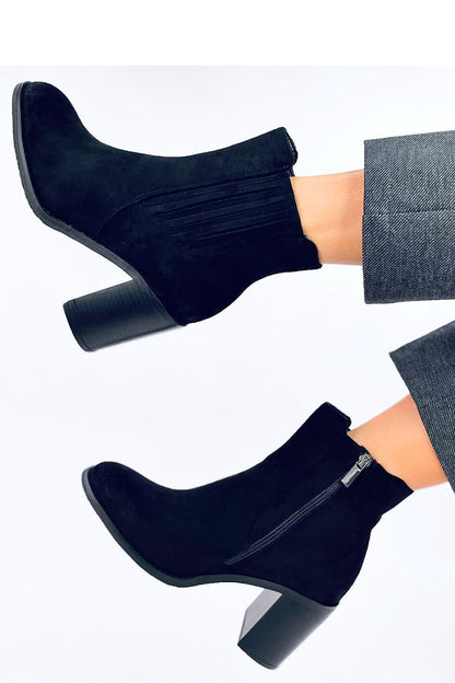 Elegant women's black heel boots by Inello, featuring 8cm heels, elastic insert, and soft fur lining, perfect for autumn styling.