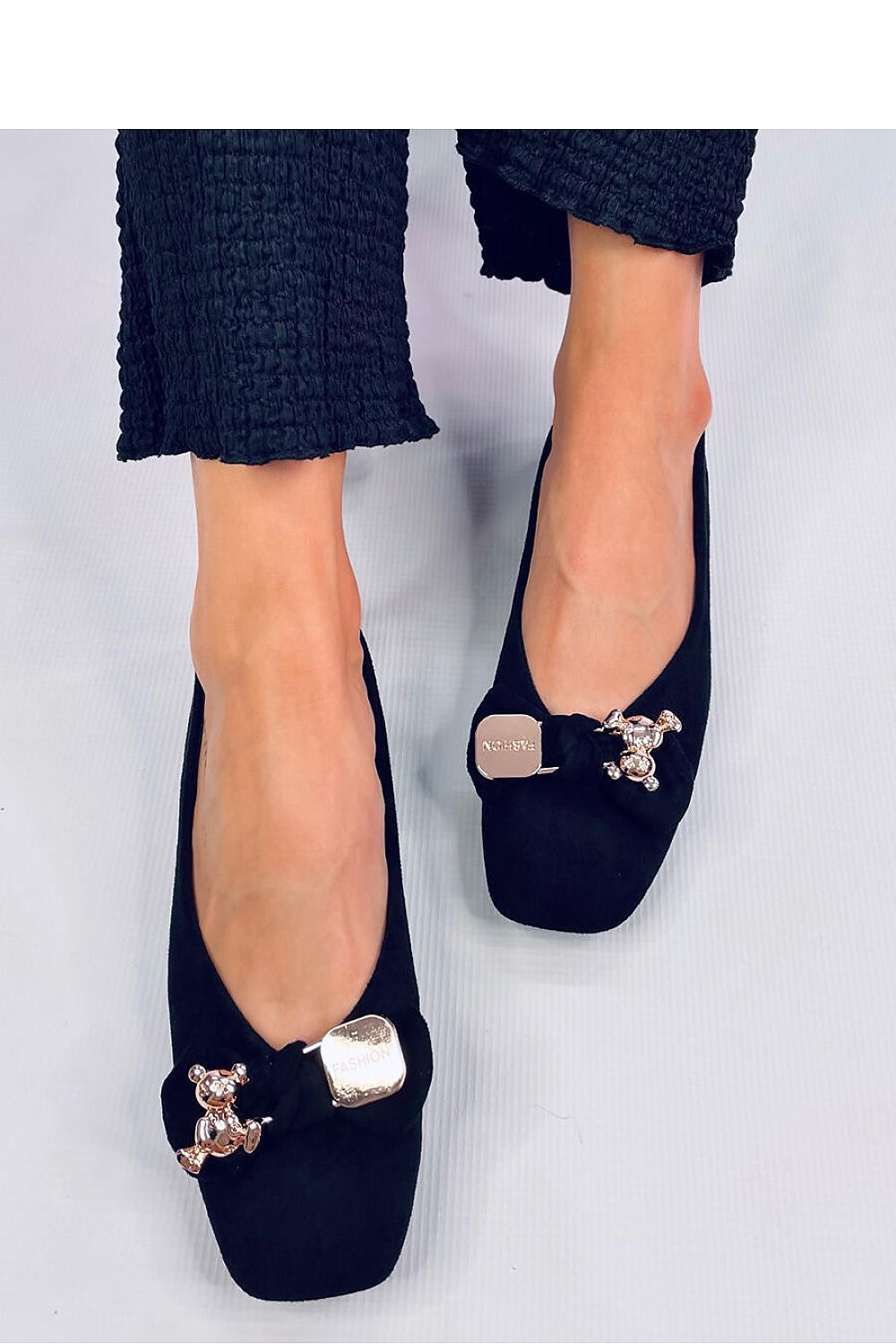 Luxurious Inello women's suede ballerinas featuring a gold bow and adorable teddy bear embellishment, showcasing an elegant square-toe design.